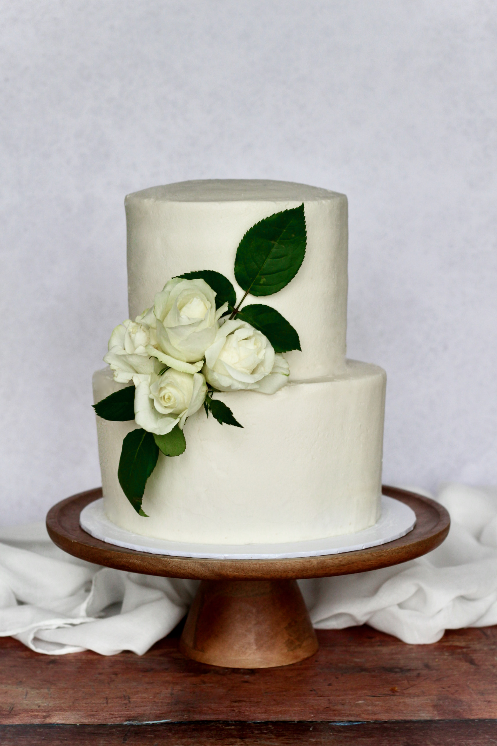 Vegan wedding cake with real flowers