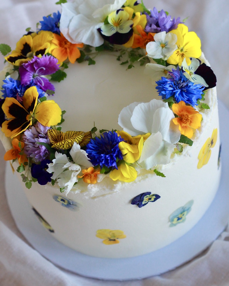 Bespoke cake with flower crown and simple pressed flowers